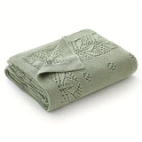 Manta tejida verde musgo