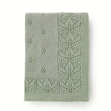 Manta tejida verde musgo